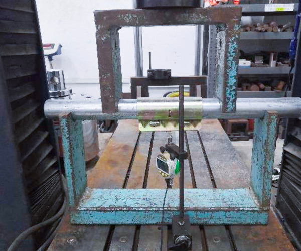 กดแขนเสื้อในการทดสอบ